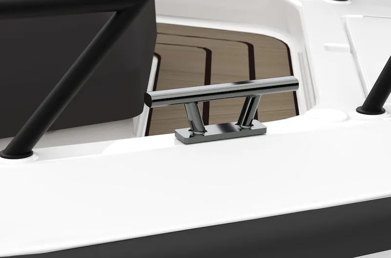 Slide: The Image of Navan S30 2025 boat cleat on sleek white deck with wood accents. - 22