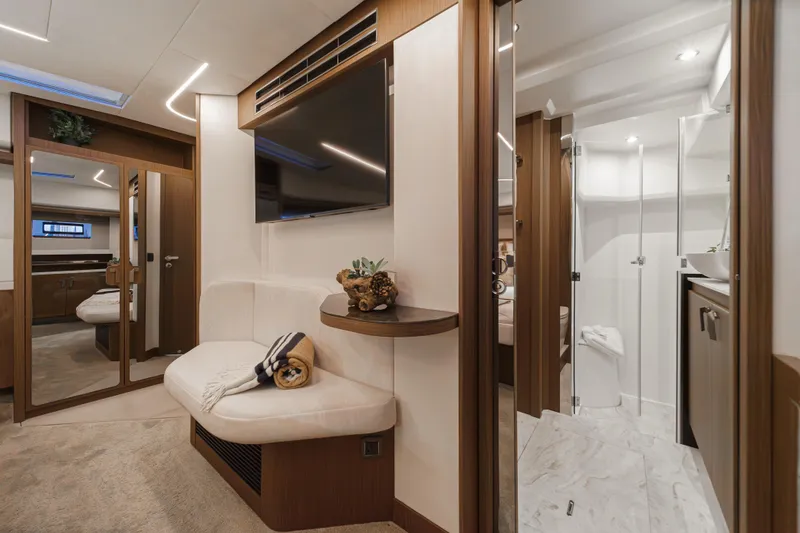 Slide: The Image of Luxurious interior of 2025 Prestige F4.9 yacht with modern furnishings and elegant design. - 17