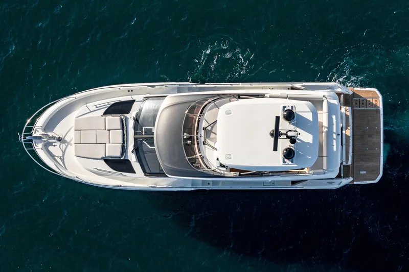 Slide: The Image of Aerial view of 2025 Prestige F4.9 yacht on deep blue water. - 19