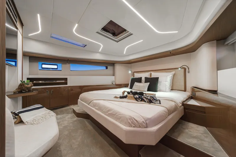 Slide: The Image of Luxurious 2025 Prestige F4.9 yacht bedroom with modern design and ambient lighting. - 20