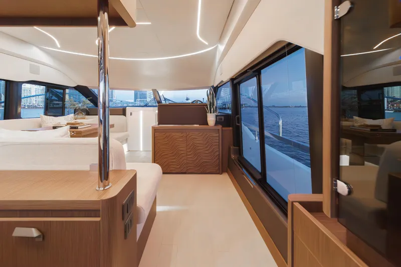 Slide: The Image of Luxurious interior of 2025 Prestige F4.9 yacht with modern design and waterfront view. - 24
