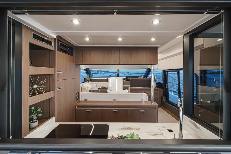 Slide: The Image of Luxurious interior of 2025 Prestige F4.9 yacht with modern kitchen and elegant design. - 30