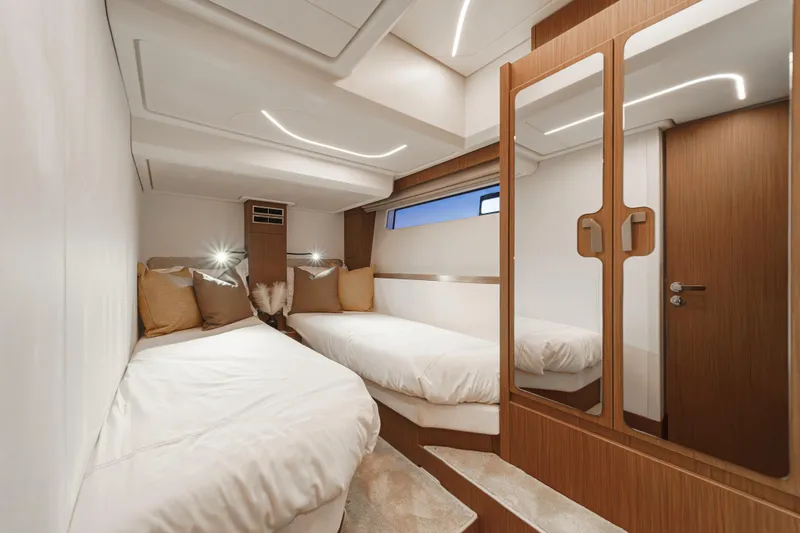 Slide: The Image of Luxurious cabin interior of 2025 Prestige F4.9 yacht with twin beds and modern design. - 31