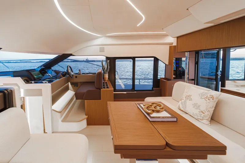 Slide: The Image of Luxurious interior of 2025 Prestige F4.9 yacht with elegant seating and ocean view. - 32