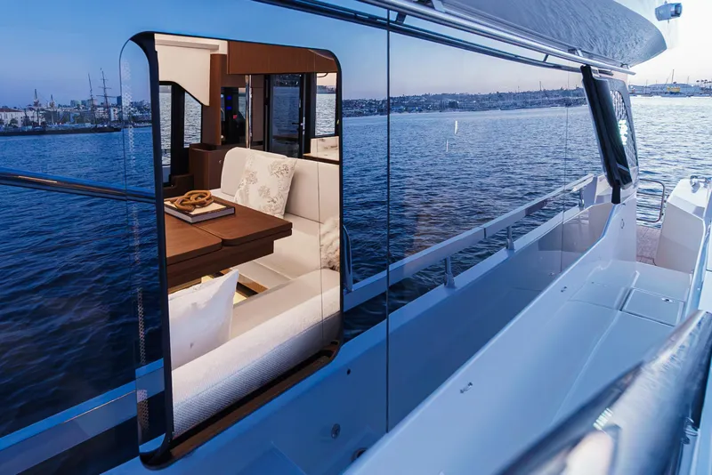 Slide: The Image of Luxury Prestige F4.9 yacht interior with waterfront view, 2025 model. - 40