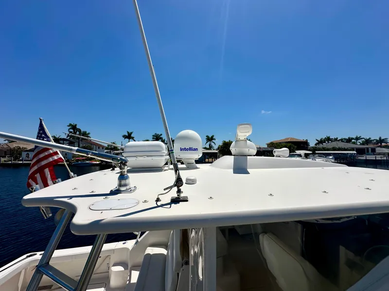 Slide: The Image of Tiara Yachts 4300 Open 2018 model, featuring a sleek deck with navigation equipment. - 35