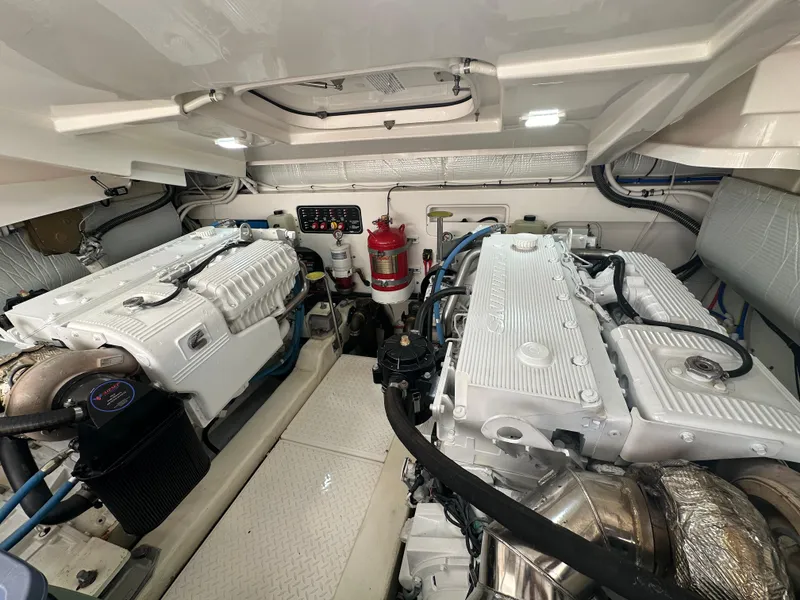 Slide: The Image of Engine room of 2018 Tiara Yachts 4300 Open, featuring dual engines and fire suppression system. - 38