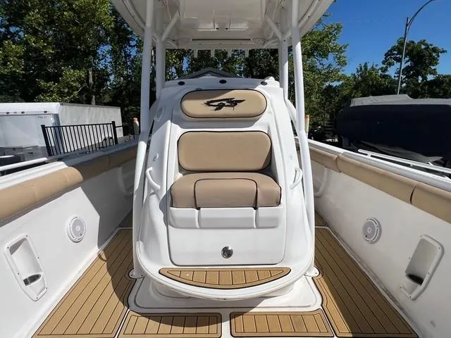 Slide: The Image of 2016 Glasstream 360 SCX boat interior with tan seating and wood-style flooring. - 19