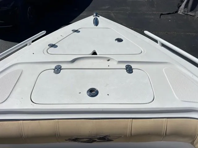 Slide: The Image of 2016 Glasstream 360 SCX boat deck with storage compartments and beige seating. - 20