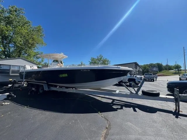Slide: The Image of 2016 Glasstream 360 SCX boat on trailer under clear blue sky. - 3