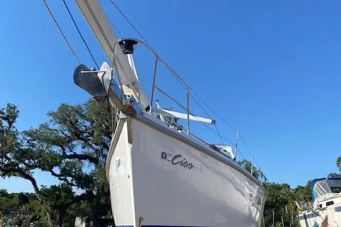 Slide: The Image of 1999 Hunter Passage 420 sailboat, docked, clear blue sky background. - 2
