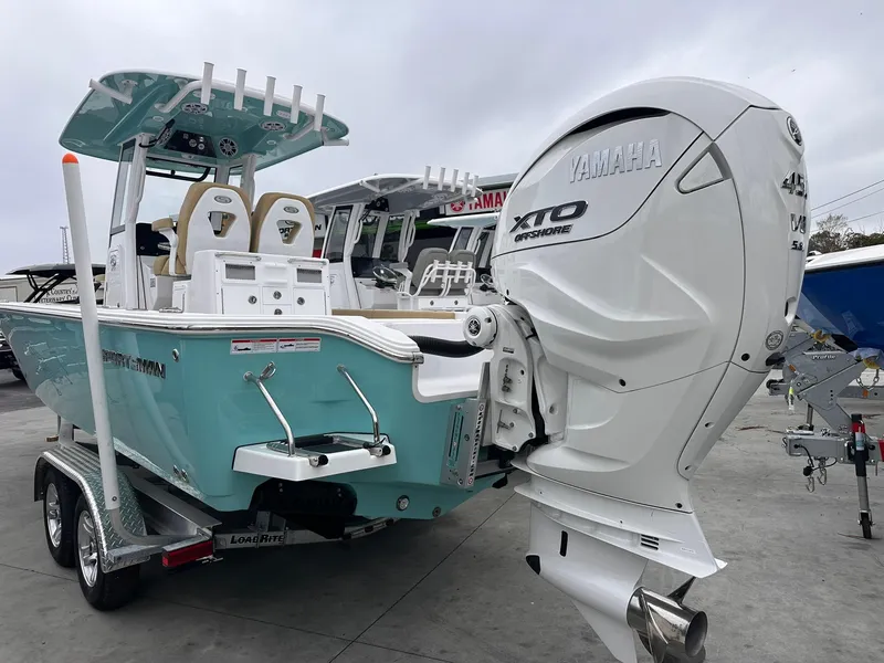 Slide: The Image of 2024 Sportsman Masters 267OE Bay Boat with Yamaha XTO outboard engine on trailer. - 11