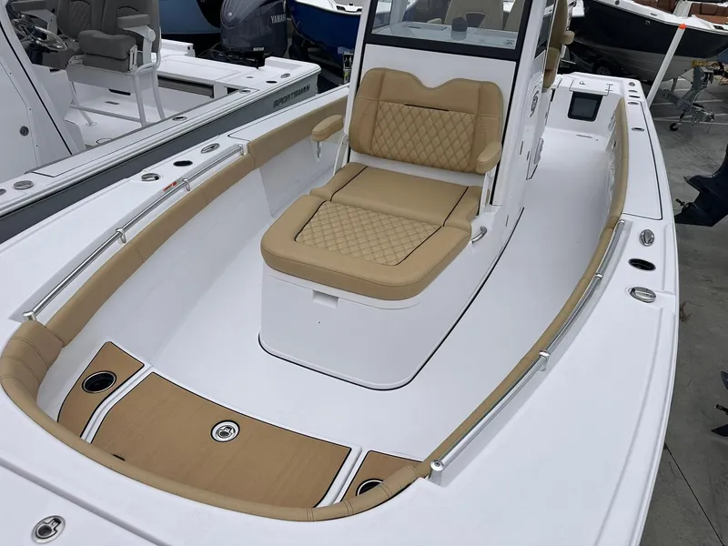 Slide: The Image of 2024 Sportsman Masters 267OE Bay Boat with tan seating and spacious deck. - 33