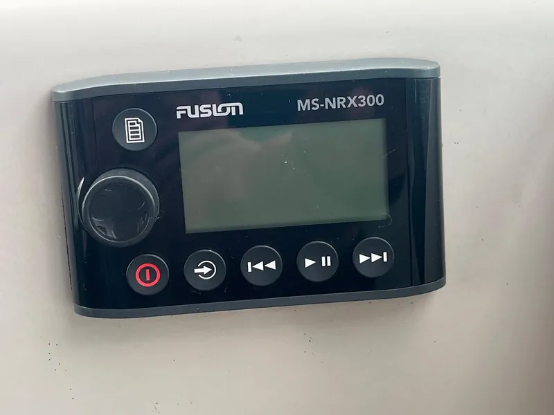 Slide: The Image of Fusion MS-NRX300 marine stereo remote on a 1993 Regal 9.8 VENTURA boat. - 21