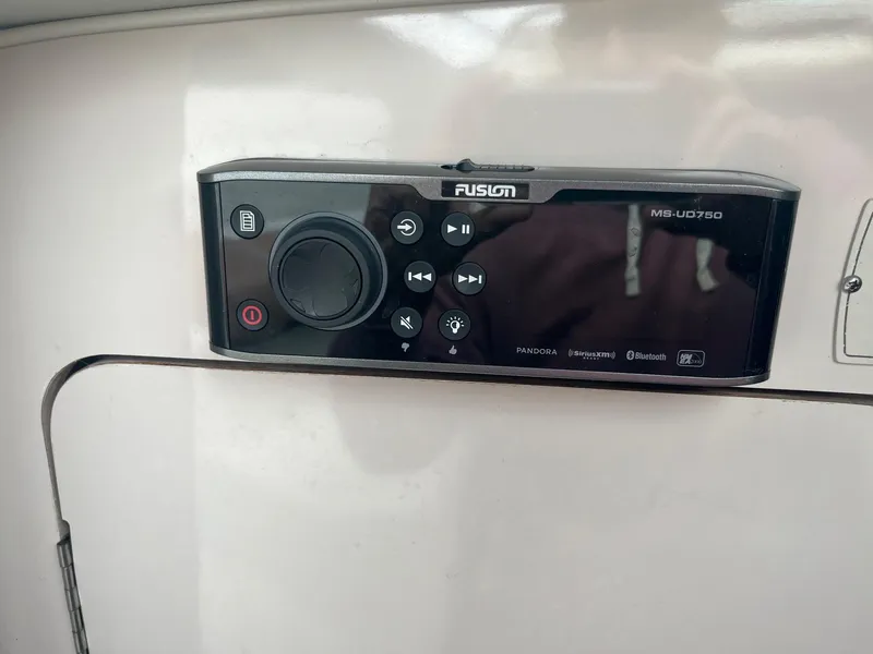 Slide: The Image of Stereo system on a 1993 Regal 9.8 VENTURA boat dashboard. - 22