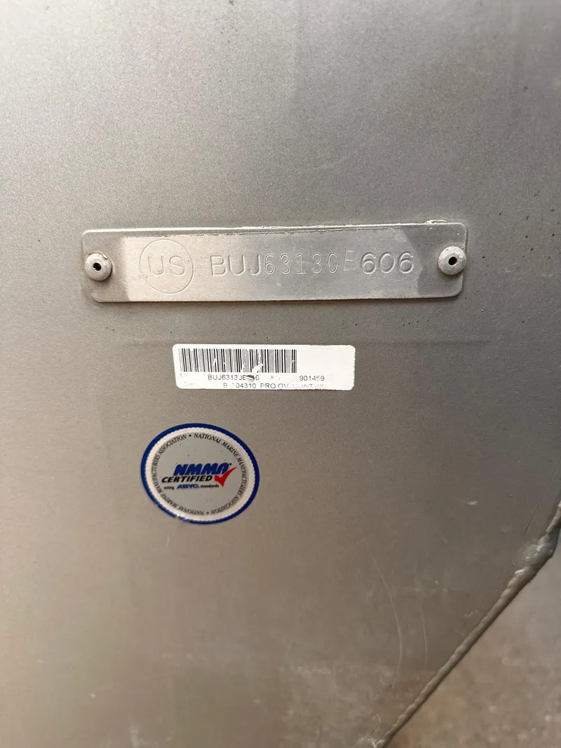 Slide: The Image of 2006 Tracker Pro Guide V-17 WT boat identification plate and certification sticker. - 10