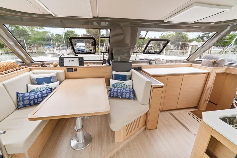 Slide: The Image of Luxurious interior of 2022 Nautitech 40 Open catamaran with modern seating and dining area. - 14