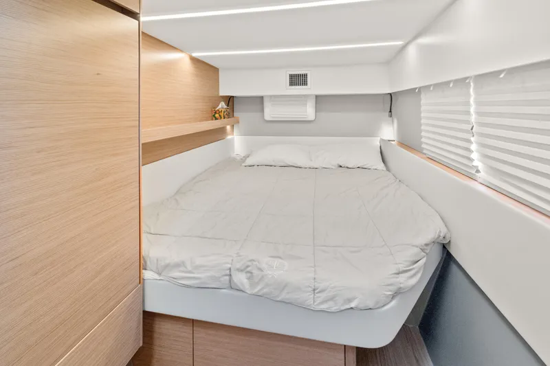 Slide: The Image of Interior cabin of 2022 Nautitech 40 Open catamaran with cozy bed and modern design. - 19