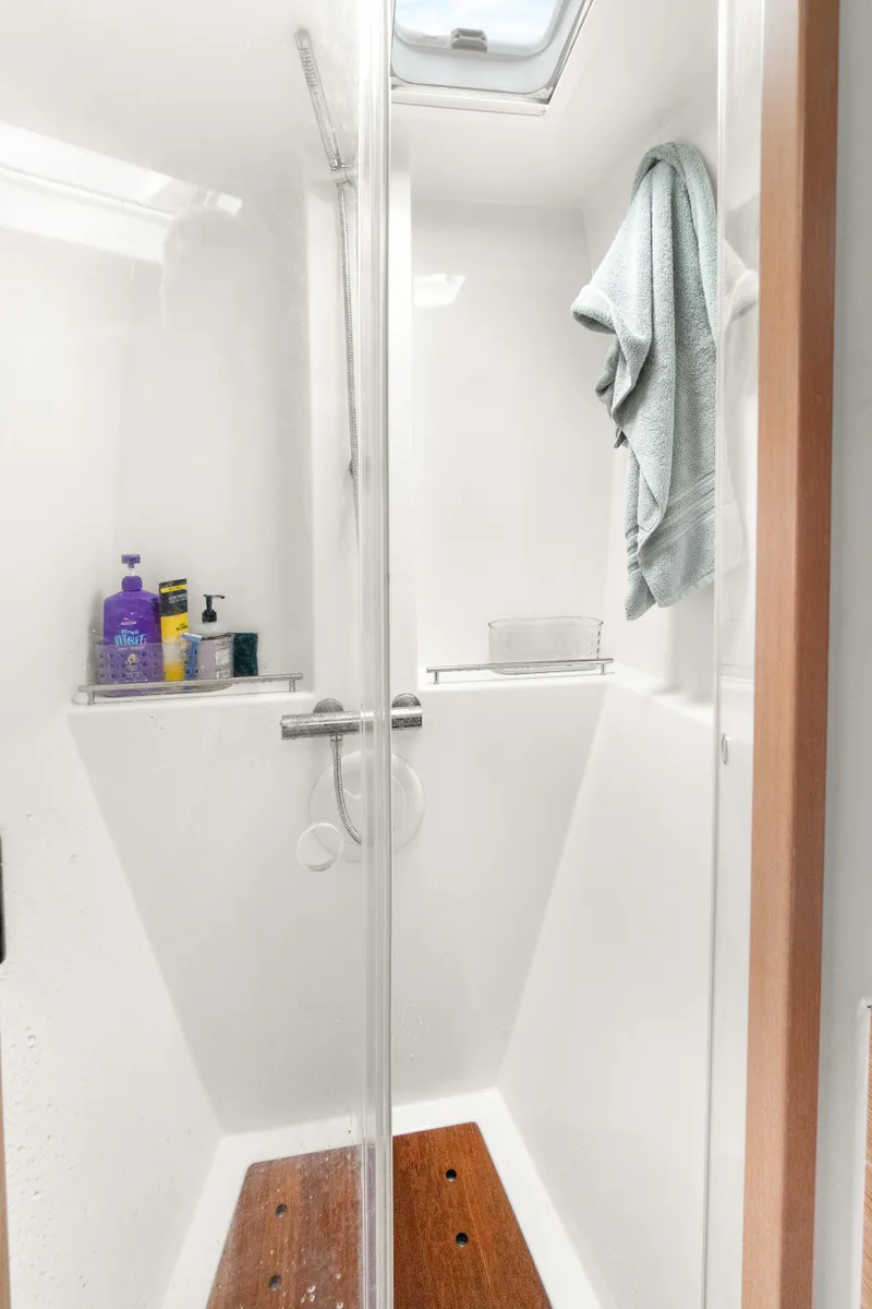 Slide: The Image of Shower area in 2022 Nautitech 40 Open yacht with toiletries and towel. - 25