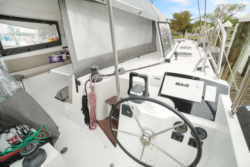 Slide: The Image of 2022 Nautitech 40 Open yacht cockpit with steering wheel and navigation equipment. - 44