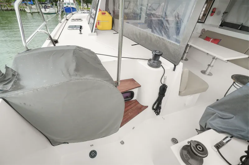 Slide: The Image of Nautitech 40 Open 2022 catamaran deck with covered equipment and seating area. - 46