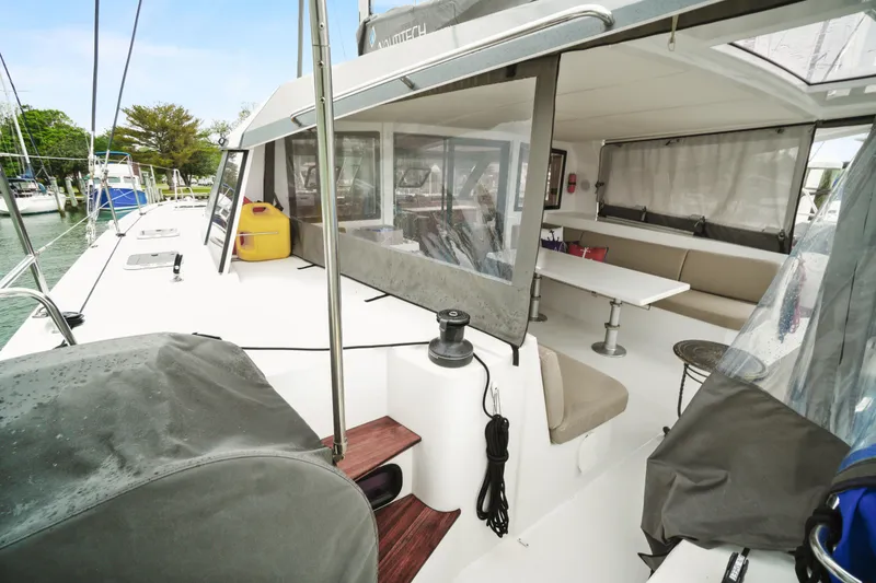 Slide: The Image of 2022 Nautitech 40 Open catamaran with spacious deck and seating area. - 7