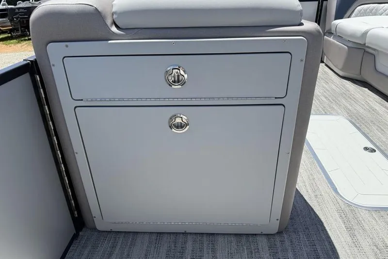 Slide: The Image of 2025 Godfrey Sweetwater 2286 SB boat interior storage compartment with sleek design and modern finish. - 19
