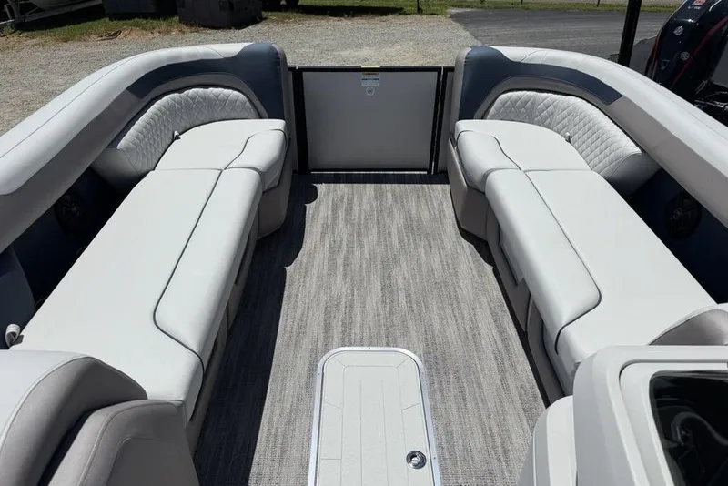 Slide: The Image of Interior of 2025 Godfrey Sweetwater 2286 SB pontoon boat with plush seating and modern design. - 7