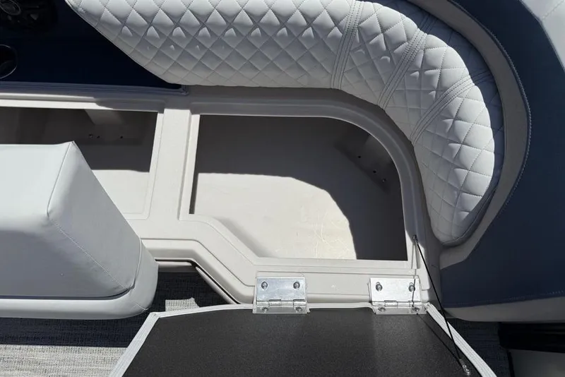 Slide: The Image of Interior view of 2025 Godfrey Sweetwater 2286 SB boat with quilted seating. - 9