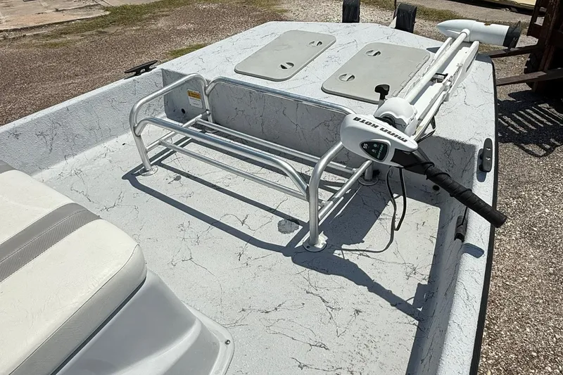 Slide: The Image of 2014 Majek 18 Redfish boat deck with seating and trolling motor. - 5