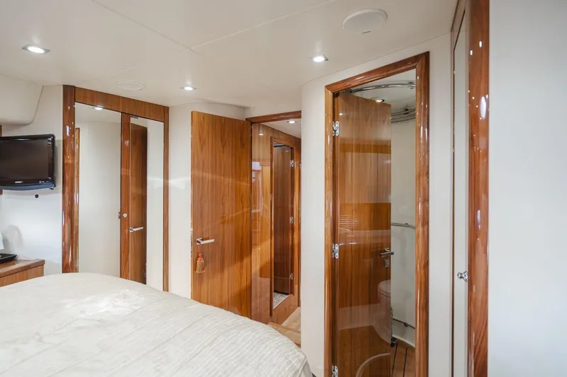 Slide: The Image of Luxurious interior of 2010 Sunseeker Manhattan 60 yacht with wood finishes and modern amenities. - 19