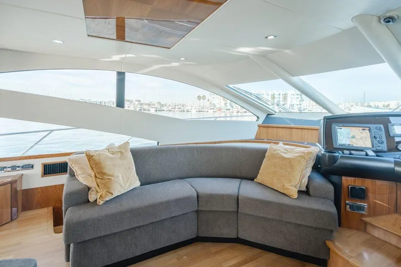 Slide: The Image of Luxurious interior of 2010 Sunseeker Manhattan 60 yacht with plush seating and navigation equipment. - 35