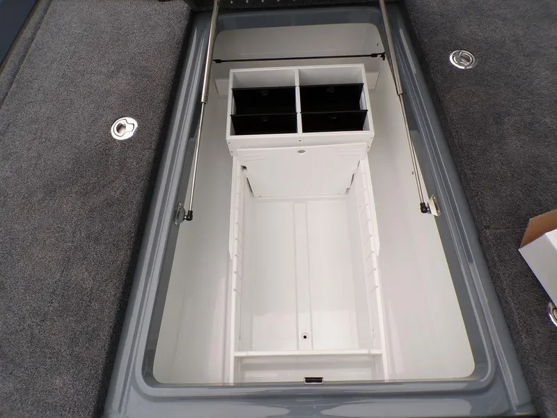 Slide: The Image of Storage compartment of 2025 Phoenix 921 ELITE boat, featuring organized interior layout. - 11