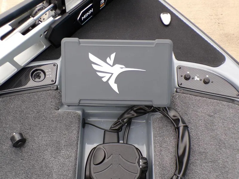 Slide: The Image of 2025 Phoenix 921 ELITE boat dashboard with logo and control panel. - 14