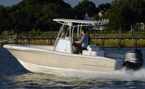 Slide: The Image of 2019 Pioneer 222 Sportfish boat cruising on water with Yamaha engine. - 11
