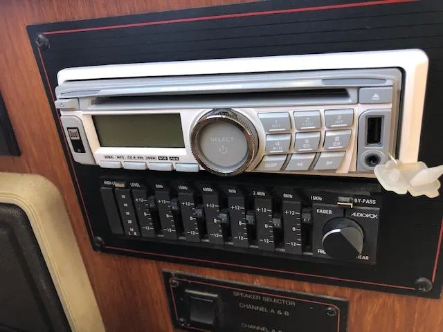 Slide: The Image of 1988 Bayliner 3818 Motoryacht stereo system with equalizer and speaker selector. - 20