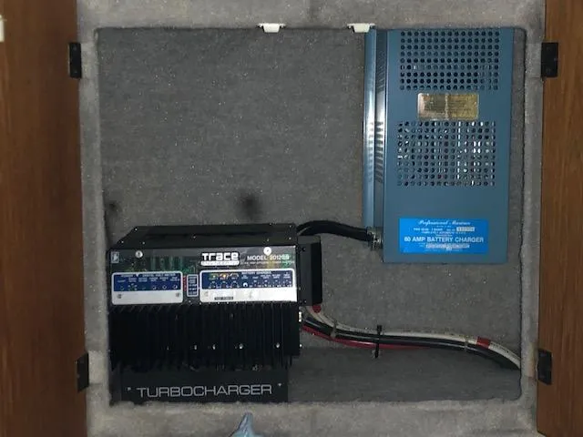 Slide: The Image of Battery charger and turbocharger in 1988 Bayliner 3818 Motoryacht engine compartment. - 21
