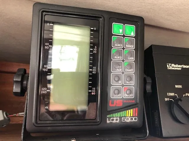 Slide: The Image of Control panel of a 1988 Bayliner 3818 Motoryacht with US Marine LOR 5000 display. - 23