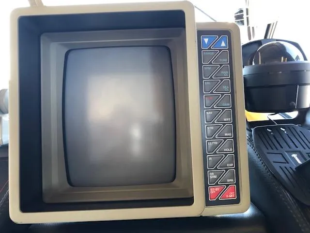 Slide: The Image of Vintage navigation system on 1988 Bayliner 3818 Motoryacht dashboard. - 25