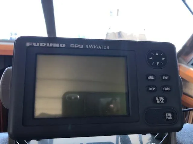 Slide: The Image of Furuno GPS Navigator on 1988 Bayliner 3818 Motoryacht dashboard. - 26