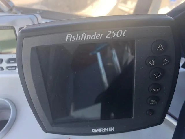 Slide: The Image of Garmin Fishfinder 250C on 1988 Bayliner 3818 Motoryacht dashboard. - 6