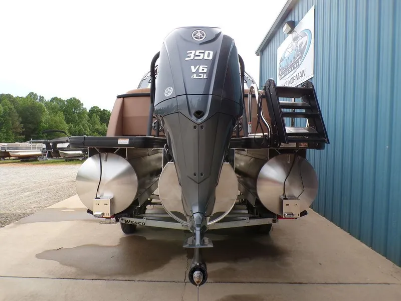 Slide: The Image of 2025 Godfrey AquaPatio 235 SBW with powerful 350 V6 engine, rear view. - 12