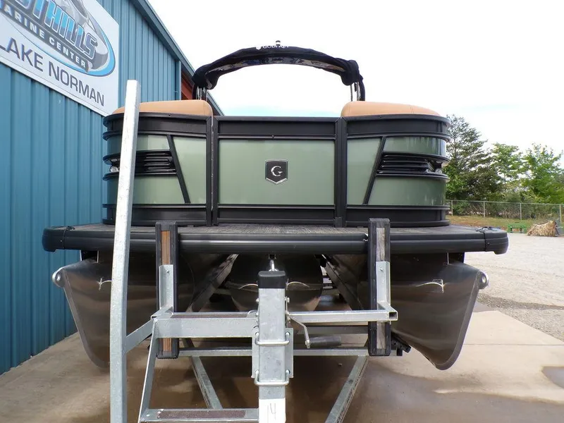 Slide: The Image of 2025 Godfrey AquaPatio 235 SBW iMPACT pontoon boat on trailer, rear view. - 15
