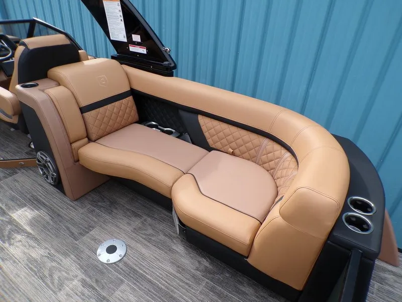 Slide: The Image of Luxurious seating on 2025 Godfrey AquaPatio 235 SBW pontoon boat with tan upholstery. - 4