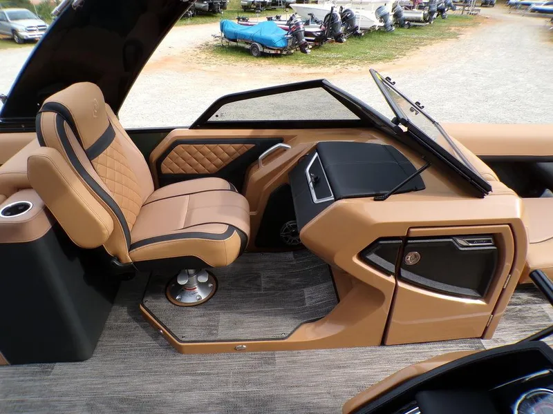 Slide: The Image of Luxurious interior of 2025 Godfrey AquaPatio 235 SBW iMPACT pontoon boat with tan seating. - 5