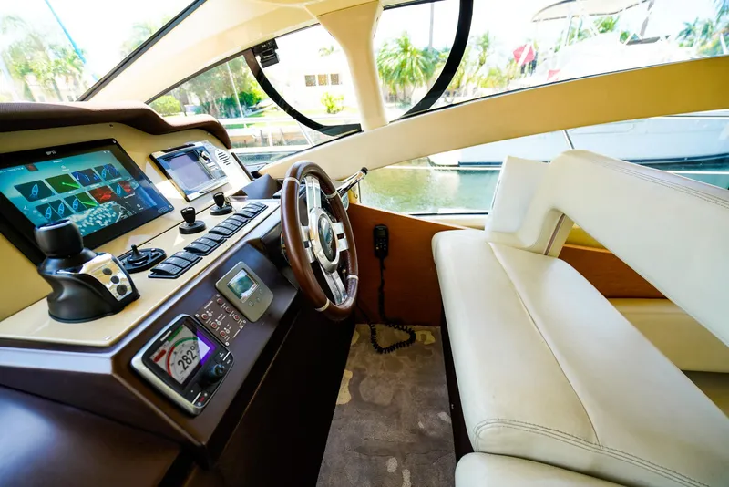 Slide: The Image of Interior cockpit of 2017 Azimut 42 Fly yacht with modern navigation controls. - 34