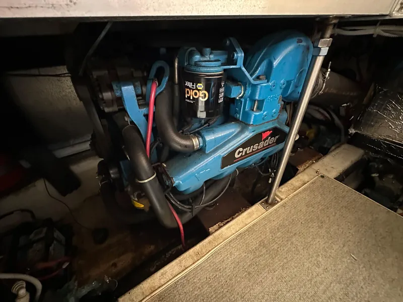 Slide: The Image of Engine compartment of a 2002 Carver AFT CABIN with a Crusader engine. - 15