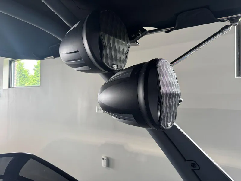 Slide: The Image of 2022 Malibu Wakesetter 25 LSV boat speakers mounted on a sleek black frame. - 22