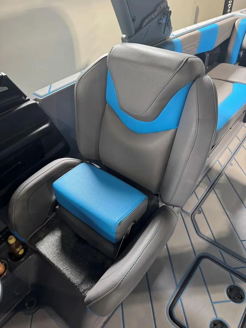 Slide: The Image of 2022 Malibu Wakesetter 25 LSV interior with gray and blue seating. - 33