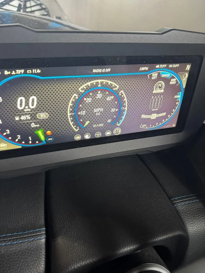 Slide: The Image of Dashboard of 2022 Malibu Wakesetter 25 LSV showing speedometer and controls. - 35